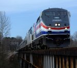 Pepsi can AMTK 160 leads Amtrak #20(20) across Fishing Creek trestle, aka, Campbell Ave. trestle.